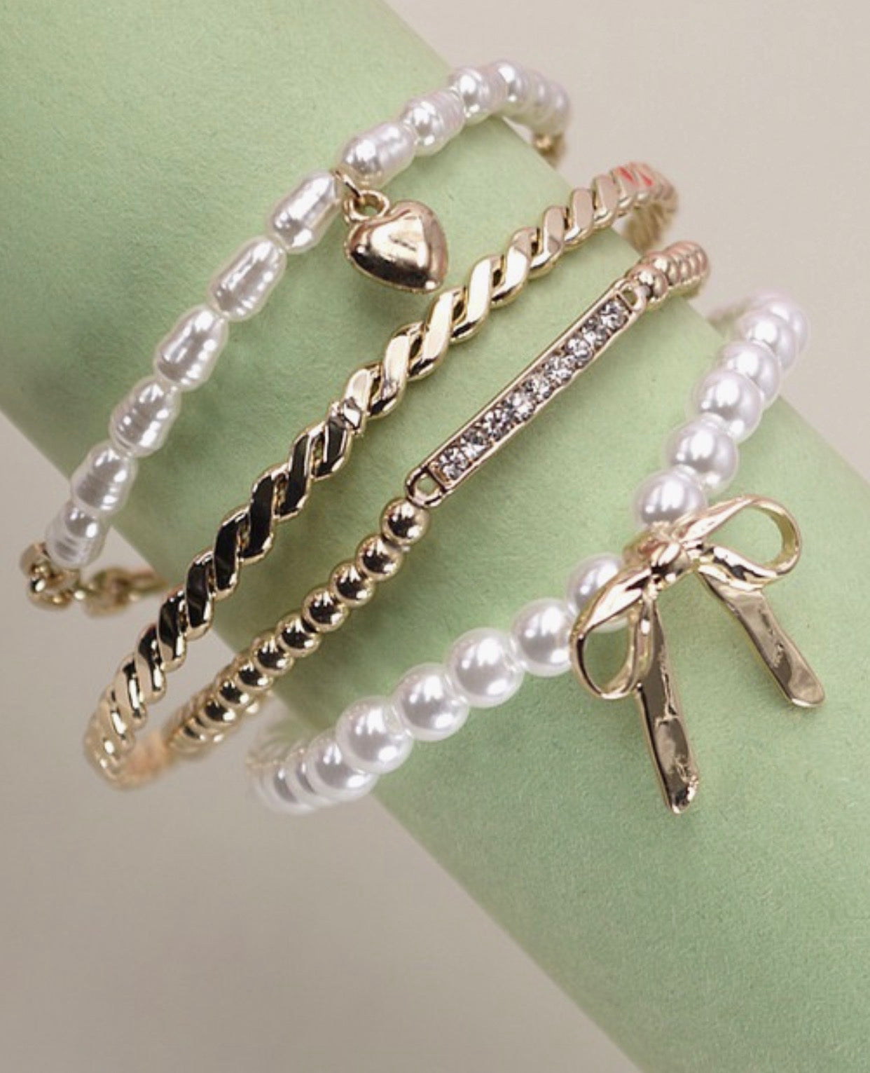 Bow pearl bangle set